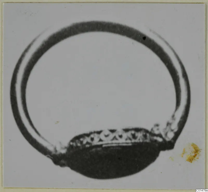 Finger ring with an oval bezel and a patterned band, from the Marion tomb finds