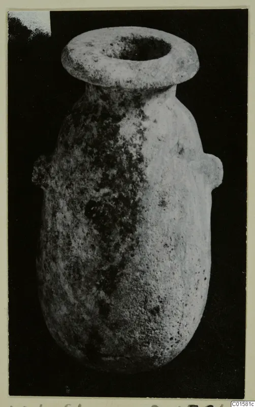 Alabaster vase with a wide flat rim and two small lug handles, from Vouni