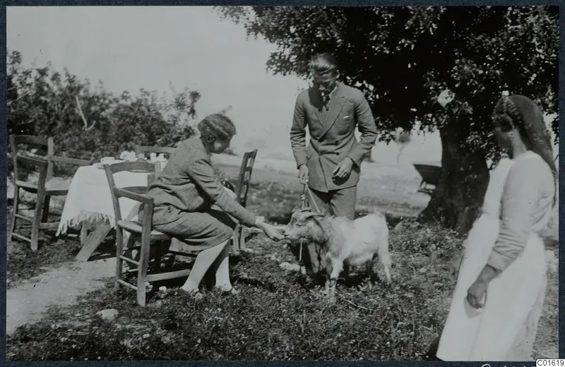 Vivi Gjerstad, Alfred Westholm and Eleni with a goat under a tree at Vouni.