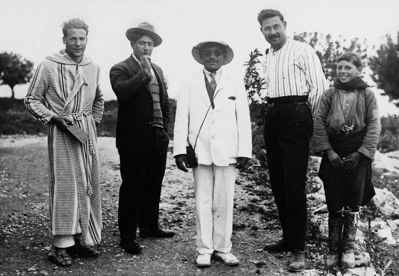 Alfred Westholm and Mavro Keratas among five people posing on a track at Vouni
