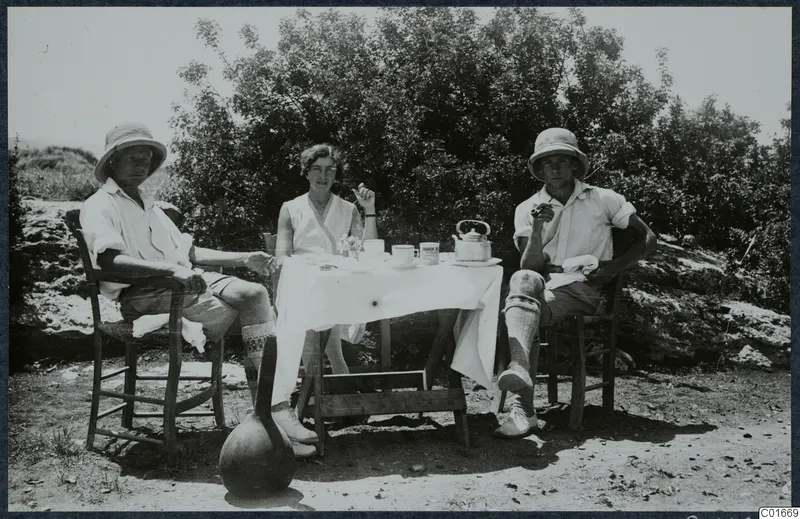 John Lindros, Vivi Gjerstad and Alfred Westholm seated at a breakfast table outdoors at Vouni
