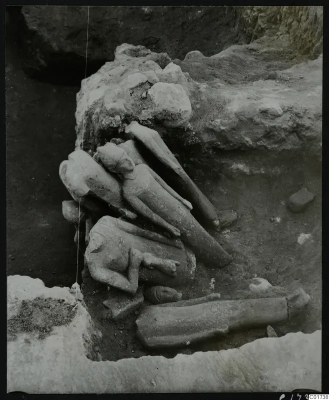 Stone sculptures lying in situ in the central pit at Kition