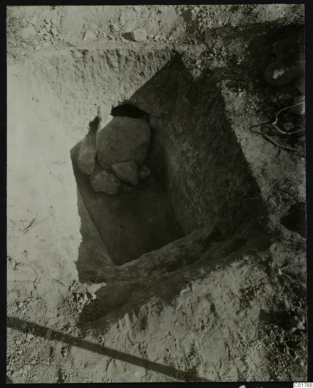 Excavation cutting with large stones at Kountoura Trachonia