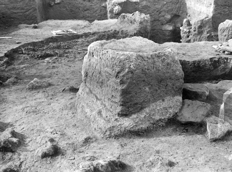 Large block of worked stone, the altar at Ayia Irini, seen from the east in an excavated area.