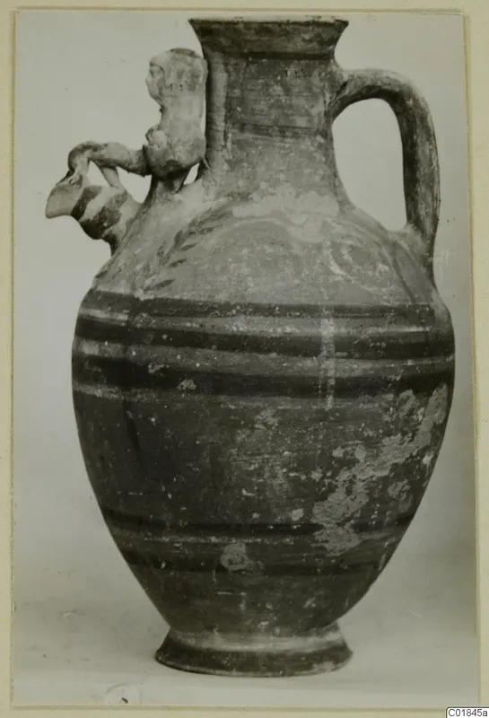 Pottery jug with a spout, loop handle and dark painted bands, from Marion