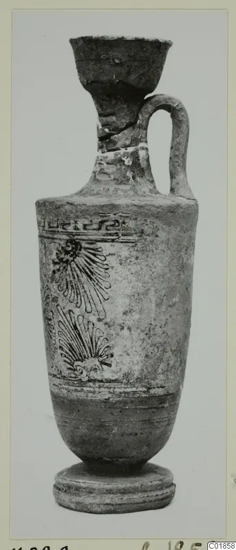 Lekythos, a white-ground pottery flask with dark painted fan motifs and a key pattern band