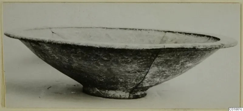 Bowl of Black-on-Red pottery, side view, with a wide flared rim and ring base.