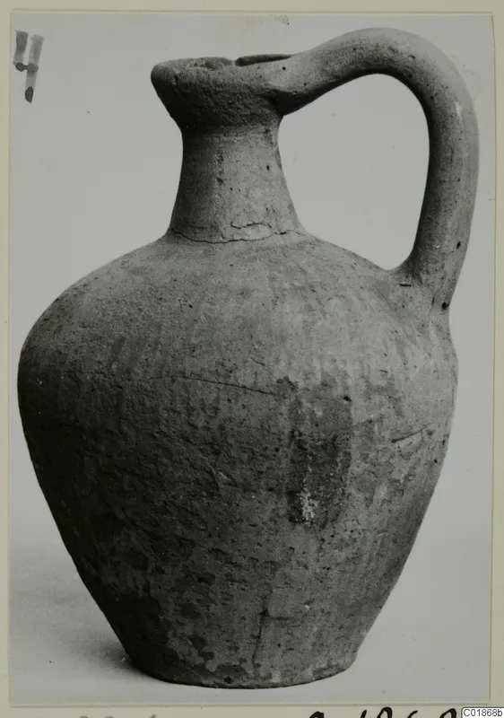 Pottery Plain White VI jug from Marion, with a single strap handle, photographed against a plain background