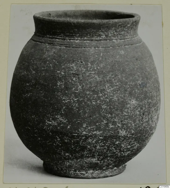 Pottery Plain White VII: a globular jar with a short flared neck and two grooves below the rim