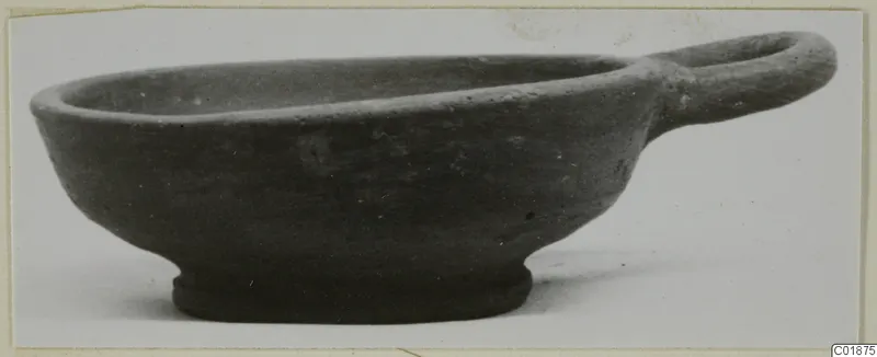 Pottery Stroke Polished Ware bowl with a single loop handle, from Marion