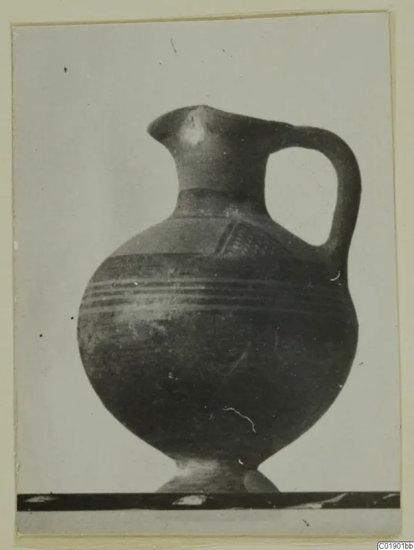 White Painted I jug from Lapithos, with a single handle and horizontal banded body