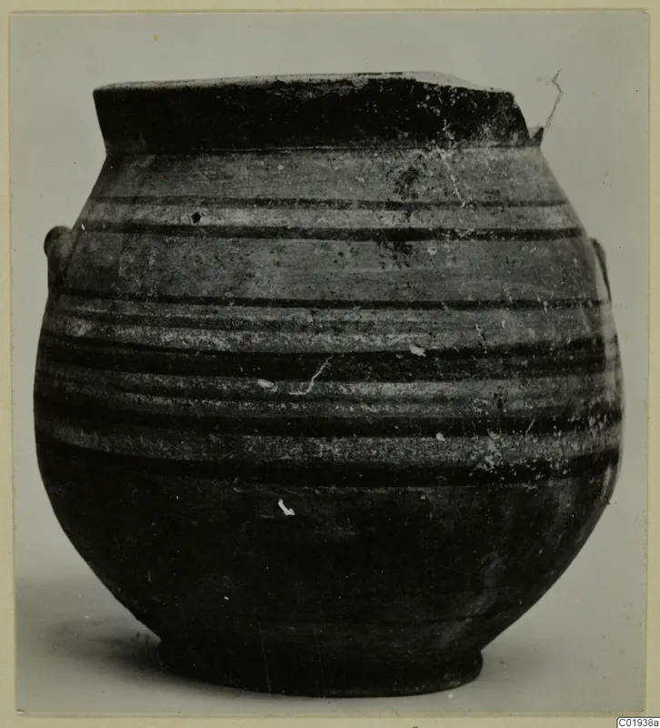 Globular pottery jar with a wide flat rim and dark horizontal painted bands on a light ground, with two small handles.