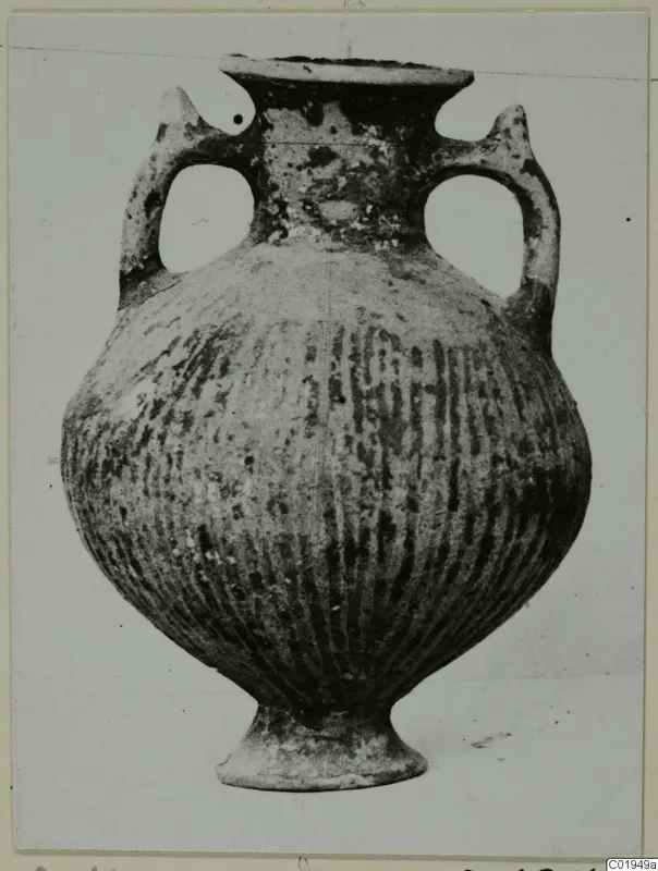 Two-handled Black Slip Ware vessel with vertical fluting, from the Lapithos Kastros tombs