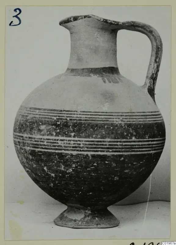 White Painted I jug from Lapithos, Kastros tombs, with a globular body, strap handle and painted bands