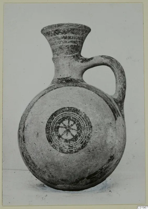 White Painted II vessel with a flaring neck, single handle and concentric-circle motif on the body