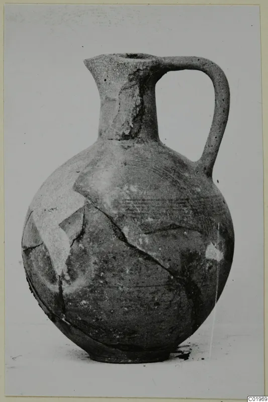 Jug with a pinched spout and a single loop handle, from the Kastros tombs at Lapithos