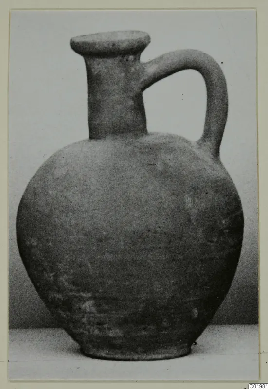 Pottery Plain White I-III jug with a round body, tall narrow neck and single loop handle