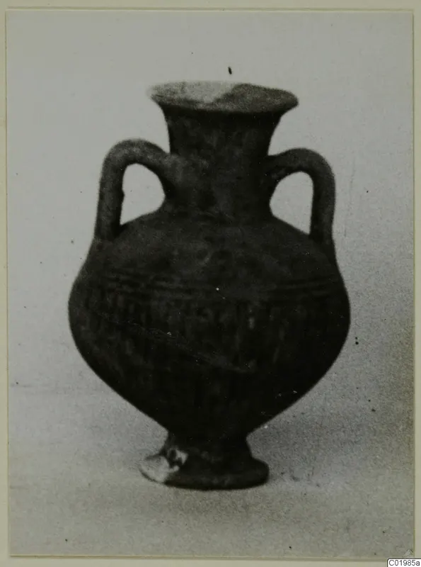 Black Slip Ware two-handled vessel from Lapithos, Kastros tombs, shown against a plain background