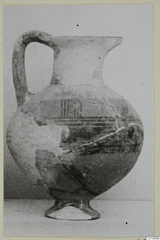 White Painted jug with a loop handle and painted bands, from the Kastros tombs at Lapithos