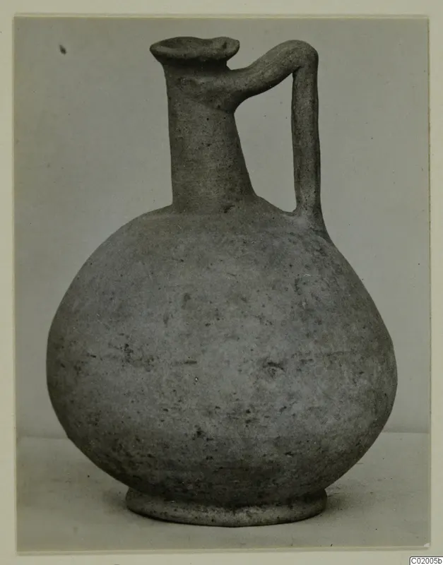 Pottery Plain White VII: globular jug with a tall neck and a single strap handle