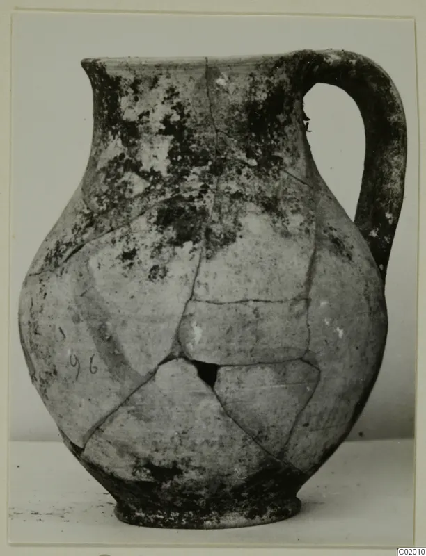 Pottery jug from Vouni, Black Slip I-VI, mended from several fragments, shown in side view