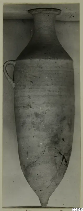 Pottery Plain White VI vessel (V.3.14) with a single loop handle, shown upright