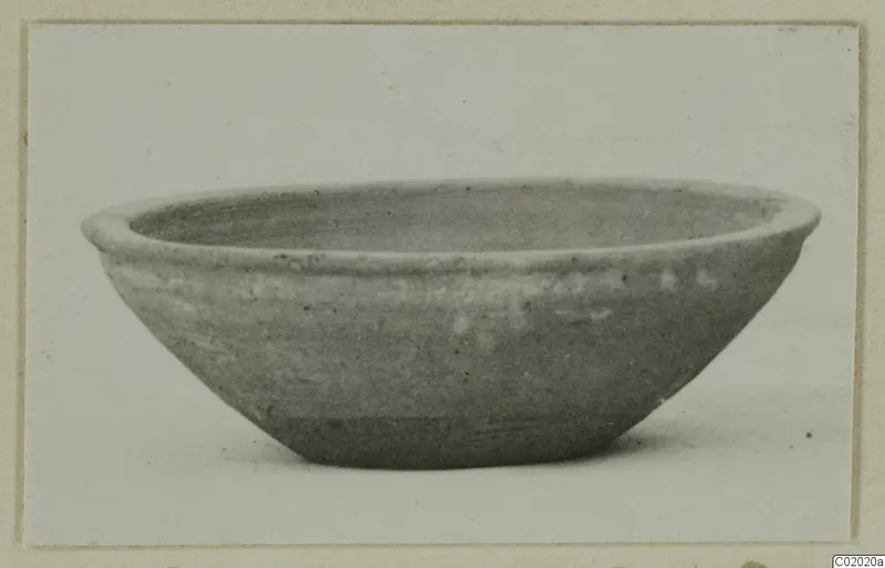 Pottery Plain White VII bowl, side view on a plain background