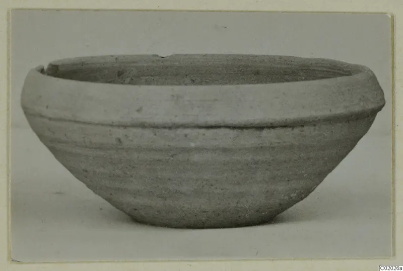 Pottery Plain White VII bowl, a plain wheel-made bowl with a thick rim and a band of grooves.