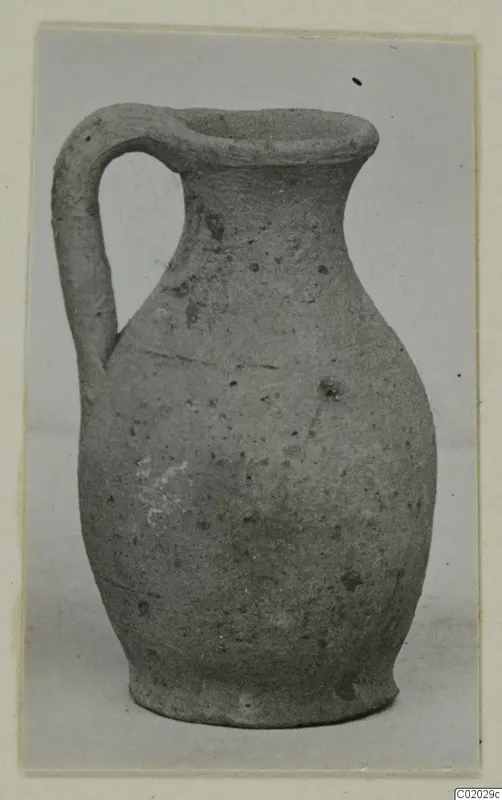 Pottery Plain White VII, a single-handled jug with a narrow neck and rounded body, photographed against a pale background