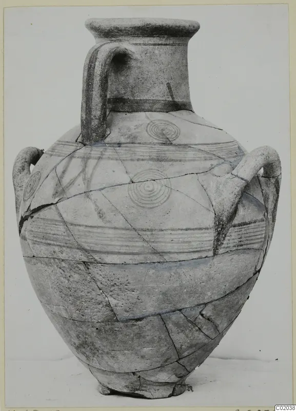 Pottery White Painted IV jar with strap handles, dark banded decoration and concentric circles