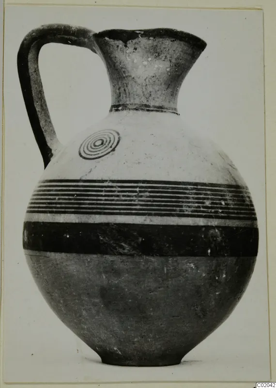 Jug with a loop handle, dark horizontal bands and a concentric-circle motif on the shoulder, from Marion