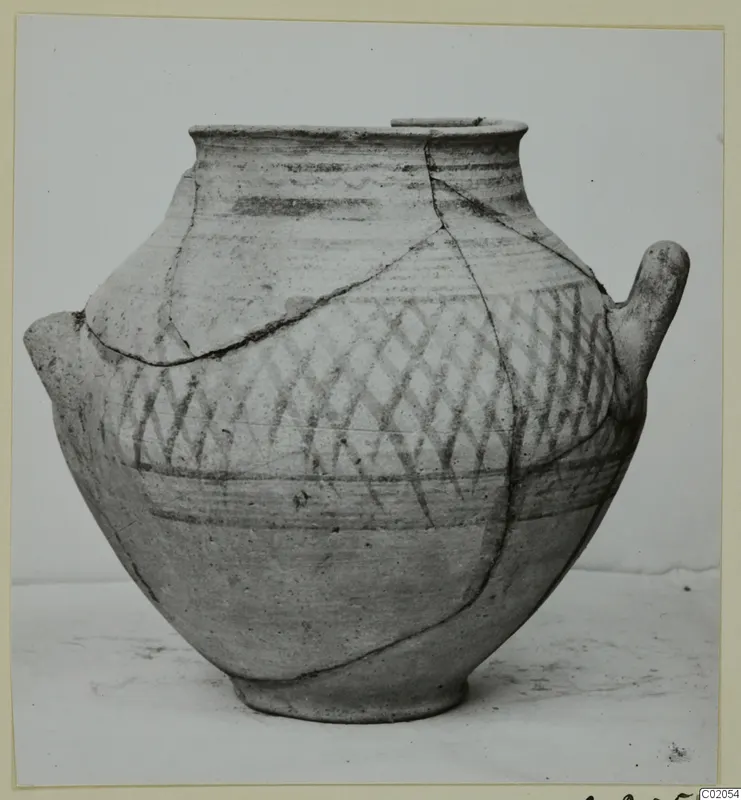 Pottery Bichrome IV amphora-crater with two handles and a cross-hatched painted band on the upper body