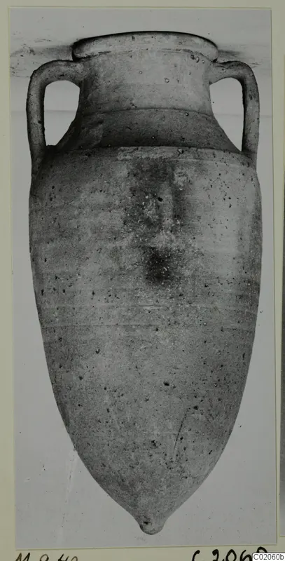 Cypro-Hell. II pottery: a two-handled vessel with a pointed base, photographed against a light background
