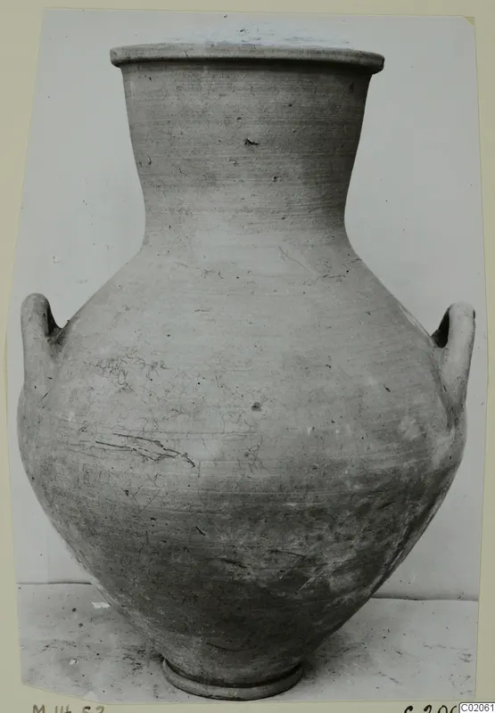 Pottery Plain White IV-V: a large two-handled jar with a narrow neck, photographed against a plain background