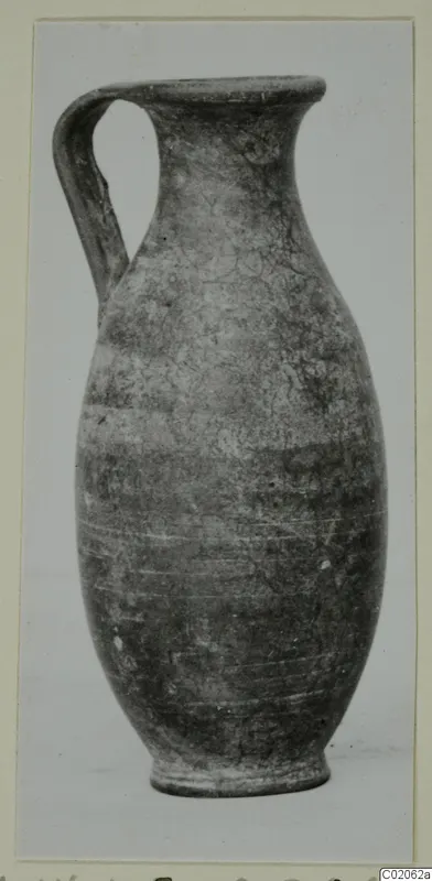 Jug with a single strap handle, tall flaring neck and rounded body, from the Hellenistic wares of Marion