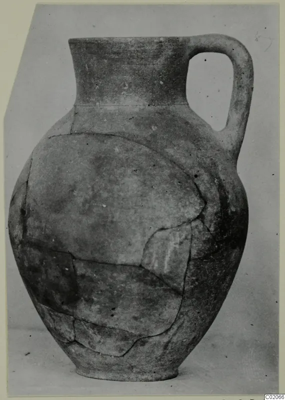 Jug from Marion with a single handle and narrow neck, reassembled from broken pieces