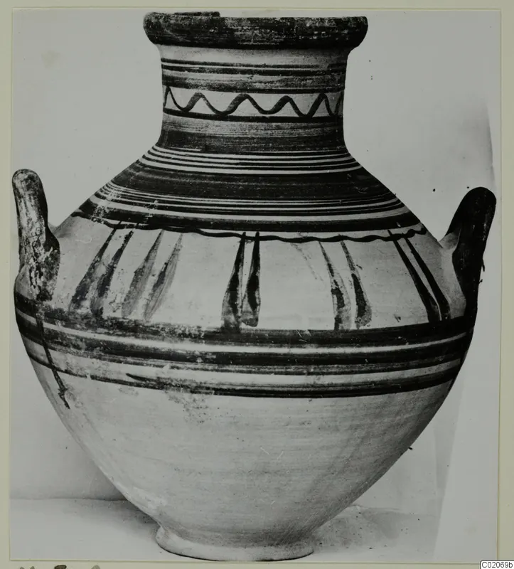 Pottery Bichrome V jar (M.5.2) with dark painted bands, a wavy neck line and two handles