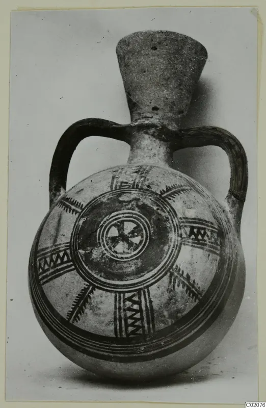 White Painted II pottery flask with two loop handles, painted concentric circles and zigzag bands