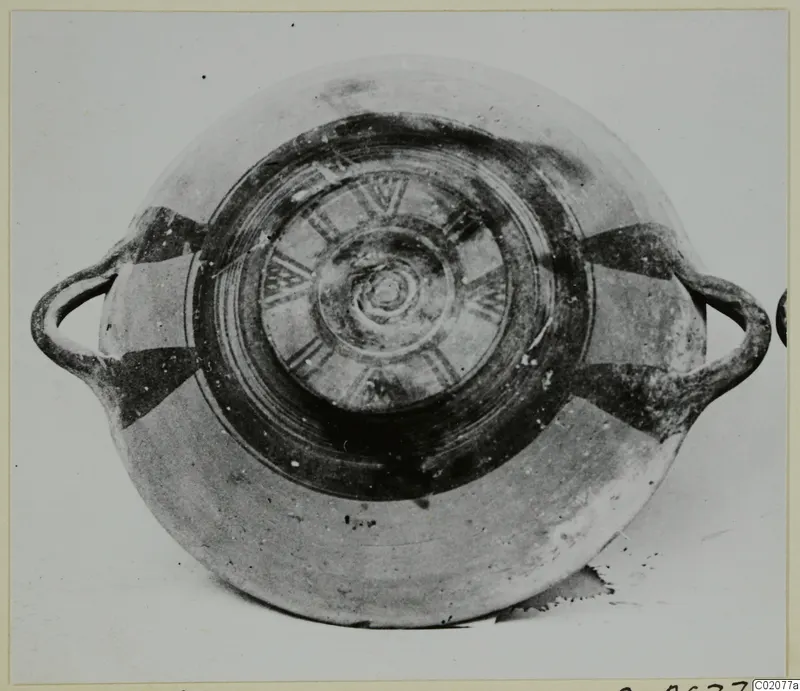 White Painted I bowl from the Kastros tombs at Lapithos, seen from above with two loop handles
