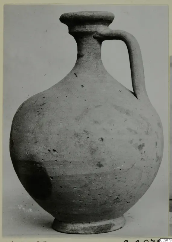 Pottery Plain White VII jug with a single loop handle and a flared rim