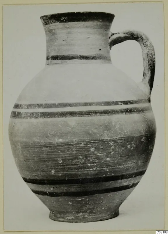 Jug with a single loop handle and dark horizontal bands, from Marion