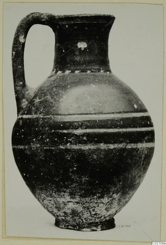 Jug with a loop handle and three pale horizontal bands around the body, from Marion
