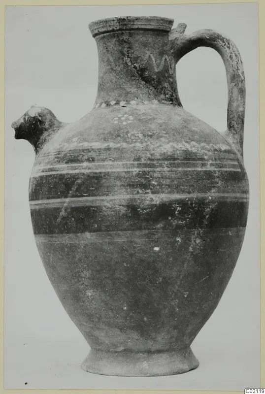Pottery jug with an animal-head spout and painted bands, from Marion