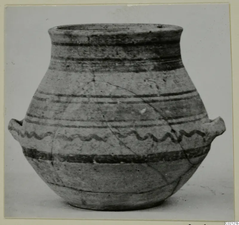 Pottery Bichrome V vessel with dark painted bands, a wavy painted line and two small handles