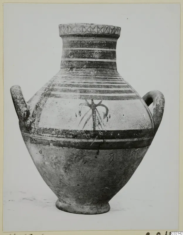 Two-handled pottery vessel with painted bands and a dark central motif, from the Marion tombs 61–98 finds