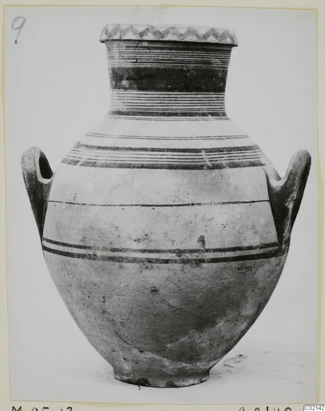 Pottery White Painted V jar with two loop handles, a zigzag band on the rim and dark painted bands on the neck and shoulder