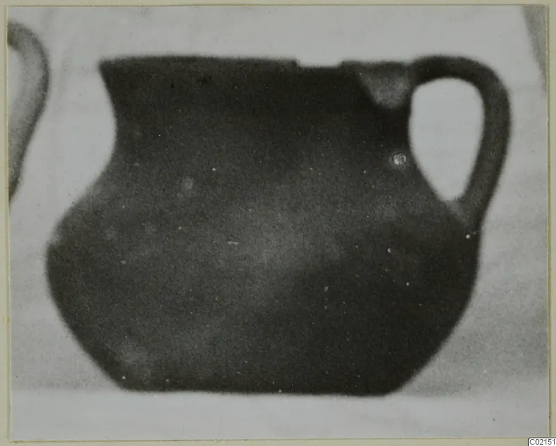 Coarse pottery vessel with a loop handle, find from Marion tombs 46–60