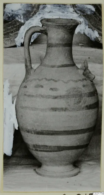 Pottery White Painted VI, a jug with a single strap handle and dark painted bands
