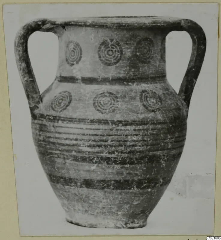 Two-handled jar with concentric circle motifs and horizontal bands, Pottery Black-on-Red II-IV