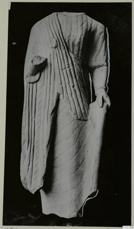 Limestone statue fragment from Vouni: a draped standing figure with the head missing